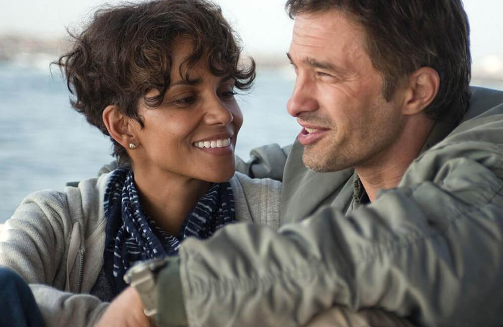 Dark Tide - Halle Berry and Olivier Martinez @whatculture / Pinterest.com